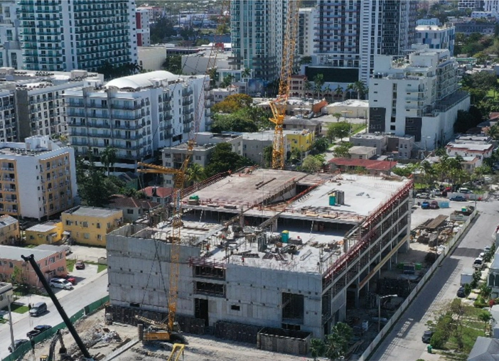 Aerial progression photos and videos by Aerial Recon Media - Aerial view of a construction site